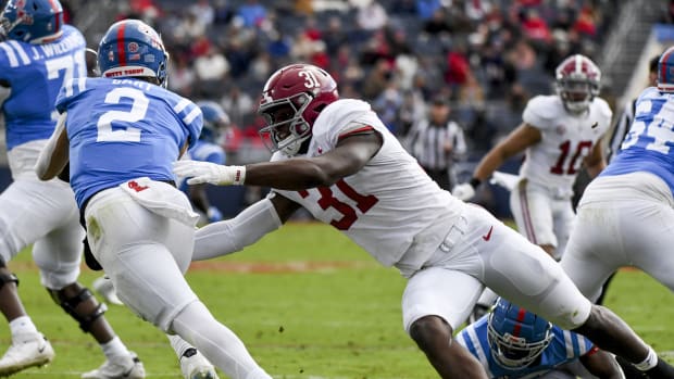 Nov 12, 2022; Oxford, Mississippi, USA; Alabama linebacker Will Anderson Jr. (31) pressures Ole Miss quarterback Jaxson Dart (2) at Vaught-Hemingway Stadium. Mandatory Credit: Gary Cosby Jr.-USA TODAY Sports